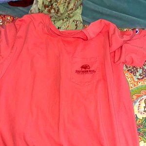 A large pink champion shirt